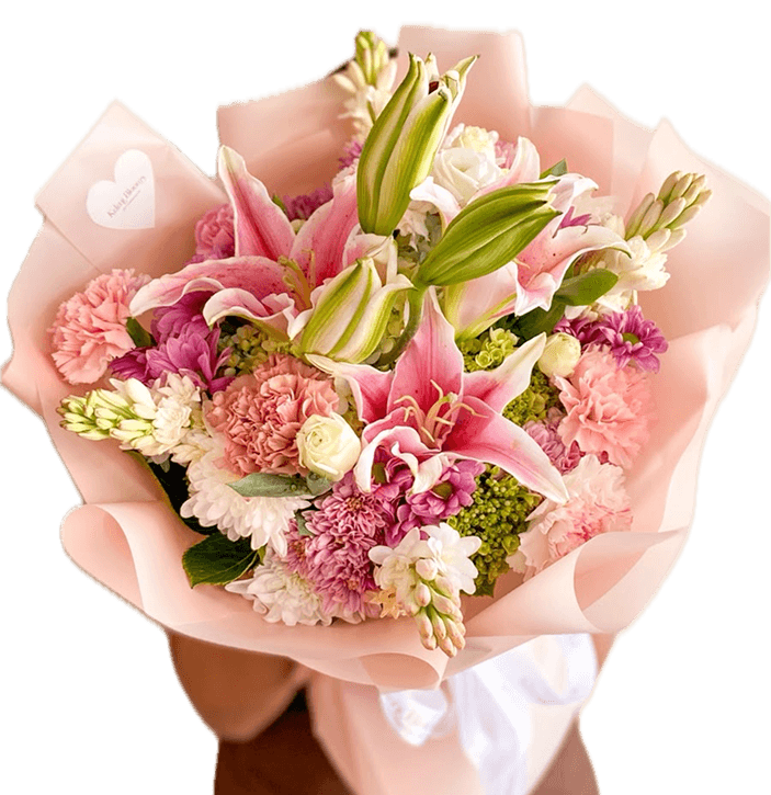 Buket bunga segar lily dan anyelir pink dengan wrapping peach dari Kalani Blooms, florist di Bali